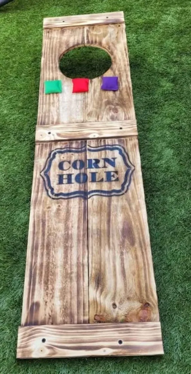 Cornhole — supplied photograph of the single-hole wooden board